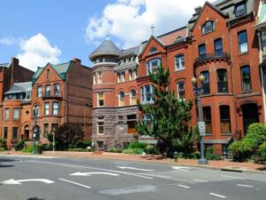Historic brick rowhouses in Washington DC showing older properties that may require land surveying before renovation