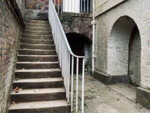 Explore questions about areaways, including boundary locations, narrow side yards, public areas, and planning exterior building work.